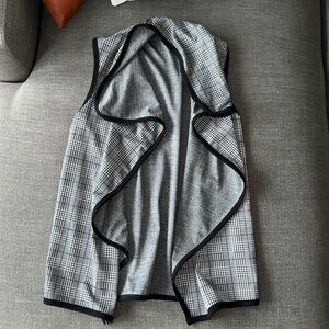 Black and white vest